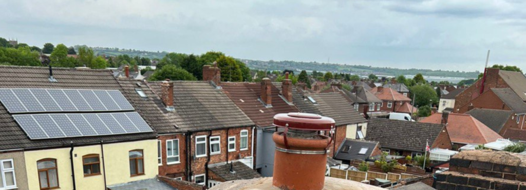 This is a photo taken from a roof which is being repaired by LS Roofing Chesham, it shows a street of houses, and their roofs